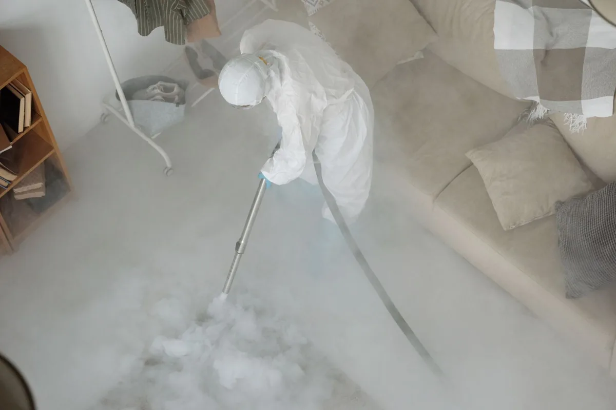 Biohazard cleanup technician in protective equipment, James Island, SC